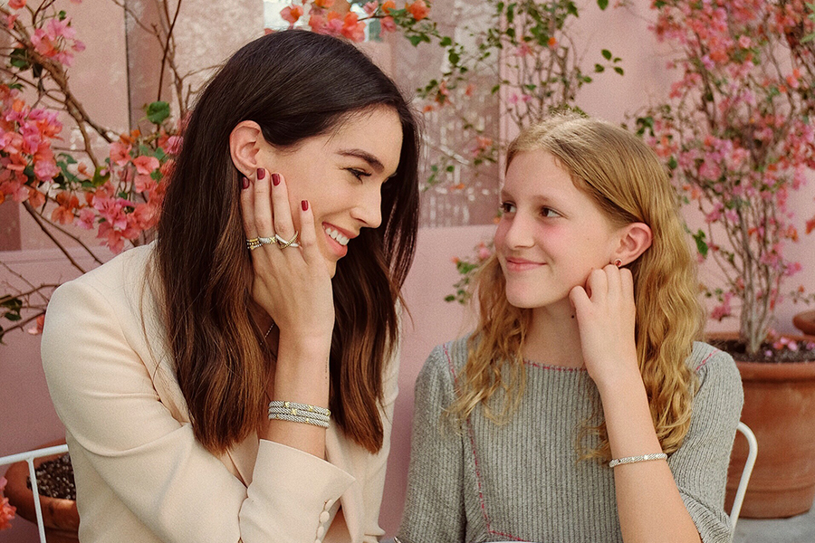 brittany xavier of thrifts and threads wears her favorite caviar jewelry with her daughter